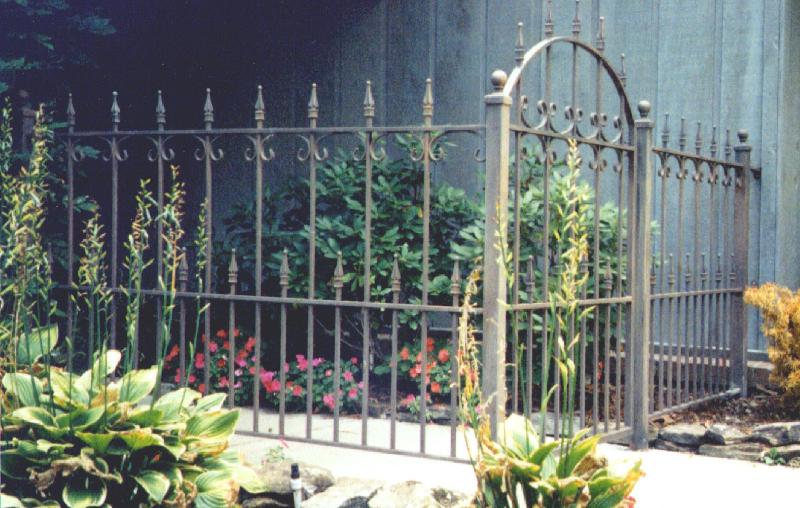 wrought iron fence and gate