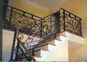 forged iron rail with bronze handrail