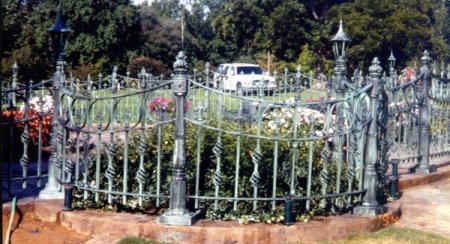 curved wrought iron fence