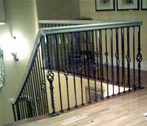 wrought iron and oak interior railing