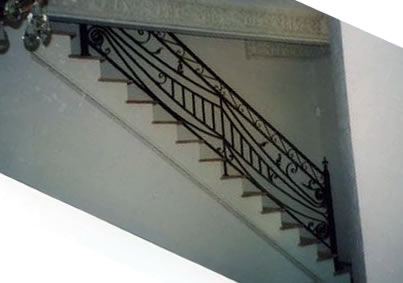 hand forged wrought iron railing on stairway