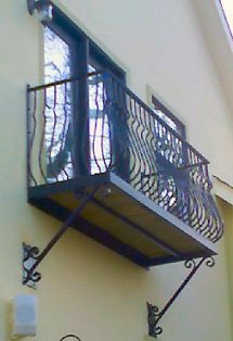wrought iron balcony with hand forged iron railing